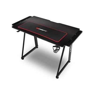 Drift DRDZ75 Esta mesa gaming ofrece la mayor estabilidad gracias a una sÃ³lida estructura. Construida en materiales premium, con un tablero laminado de fibra de carbono, que le otorga una buena protecciÃ³n, puede soportar hasta 100 kilos. Por otro lado, su compacto tamaÃ±o (100 x 60 x 75 cm) y su elegante diseÃ±o la hacen perfecta para todo tipo de espacios. Esta mesa gaming incluye una alfombrilla XL de 80 x 30 cm resistente y lavable, que protege el tablero al tiempo que asegura el control de movimientos que necesitas. Drift DZ75 no es solo una mesa gaming, es un funcional escritorio, espacioso, con accesorios prÃ¡cticos, en el que estudiar o trabajar con la mayor comodidad gracias a un diseÃ±o ergonÃ³mico que incorpora a cada uno de sus laterales un soporte de extensiÃ³n, de manera que permite ampliar la mesa hasta los 113 cm totales adaptÃ¡ndose a tus necesidades. Para que nada te interrumpa durante la partida, podrÃ¡s colgar los auriculares en el gancho que integra y tambiÃ©n dejar tu bebida en el portatazas. Las resistentes patas de la DZ75 son regulables. PodrÃ¡s ajustar las patas de la mesa gaming de modo que puedas adaptarla a tu espacio de juego o de trabajo de una manera cÃ³moda, pudiendo acercar tu silla gaming todo lo que quieras.